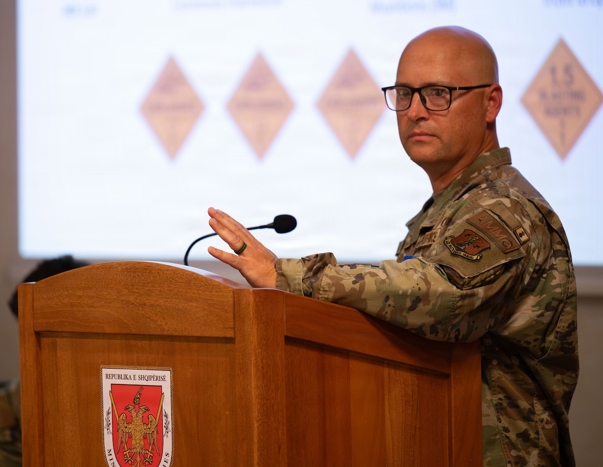 TIRANA, Albania – U.S. Air Force Senior Master Sgt. Matthew Foulk, a munitions flight senior enlisted leader assigned to the 177th Fighter Wing, New Jersey Air National Guard, provides a munitions briefing to military members from six different nations during a European Partnership Flight conference in Tirana, Albania. By sharing technical expertise and aligning operational best practices, the U.S. and our regional partners are building the foundational military capability, capacity, and mutual confidence required to lead conventional defense efforts. (U.S. Air Force photo by Tech. Sgt. Alexandra M. Longfellow)