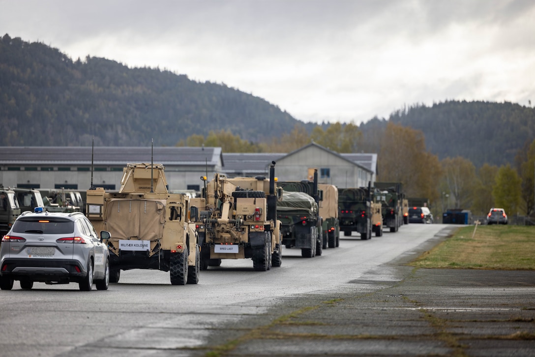 U.S. Marines and Sailors with Combat Logistics Battalion 24, Combat Logistics Regiment 27, 2nd Marine Logistics Group, conduct a long-range convoy during exercise Aurora 26 in Værnes, Norway, April 25, 2026. U.S. Marines and Sailors with 2nd MLG are participating in exercise Aurora as part of the larger U.S. Army-led Sword 26 series of linked multinational exercises, which directly supports NATO's Eastern Flank Deterrence Initiative concept, validates defense plans, builds a unified lethal force, and strengthens deterrence. (U.S. Marine Corps photo by Lance Cpl. Brady Hathaway)