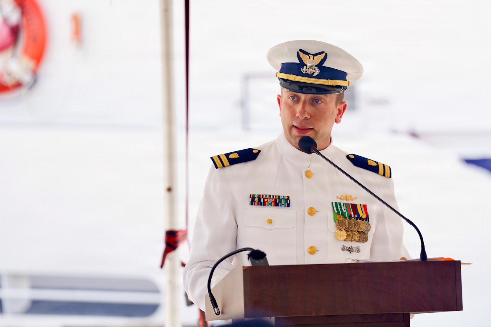 Lt. Drew Lovullo assumes command of USCGC Myrtle Hazard (WPC 1139) from Lt. Emma Saunders in a change of command ceremony on Victor Wharf in Guam on July 17, 2026. Capt. Jessica Worst, commander of U.S. Coast Guard Forces Micronesia/Sector Guam, presided over the ceremony. Under Saunders' command, Myrtle Hazard’s crew recently delivered roughly 20,000 pounds of relief supplies to five islands across the Commonwealth of the Northern Mariana Islands after Super Typhoon Sinlaku, carrying the mayor of Agrihan and Pagan to his constituents and moving equipment for Navy partners. Weeks later, after Super Typhoon Bavi, the crew ferried aids to navigation and Navy Explosive Ordnance Disposal teams across the Marianas, running sonar assessments off Rota and supporting the assessments that reopened the ports of Tinian and Rota. (U.S. Coast Guard photo by Lt. Sara Muir)