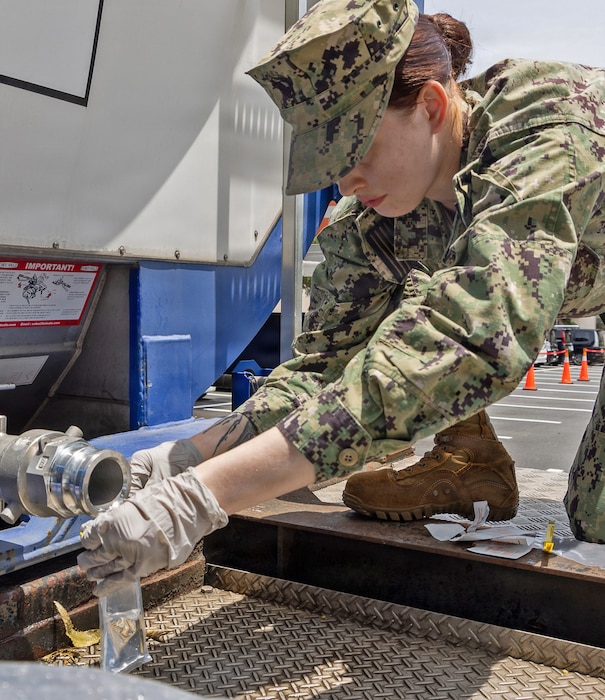 YOKOSUKA, Japan (June 16, 2026) Hospital Corpsman 3rd Class Casandra Tisdale, a preventive medicine technician assigned to U.S. Naval Hospital Yokosuka's Directorate for Public Health (DPH) collects a water sample from a tanker. DPH collected samples from multiple locations across the installation to support water quality testing following repairs to the installation's water distribution system. (U.S. Navy photo by Daniel Taylor/USNH Yokosuka Public Affairs)
