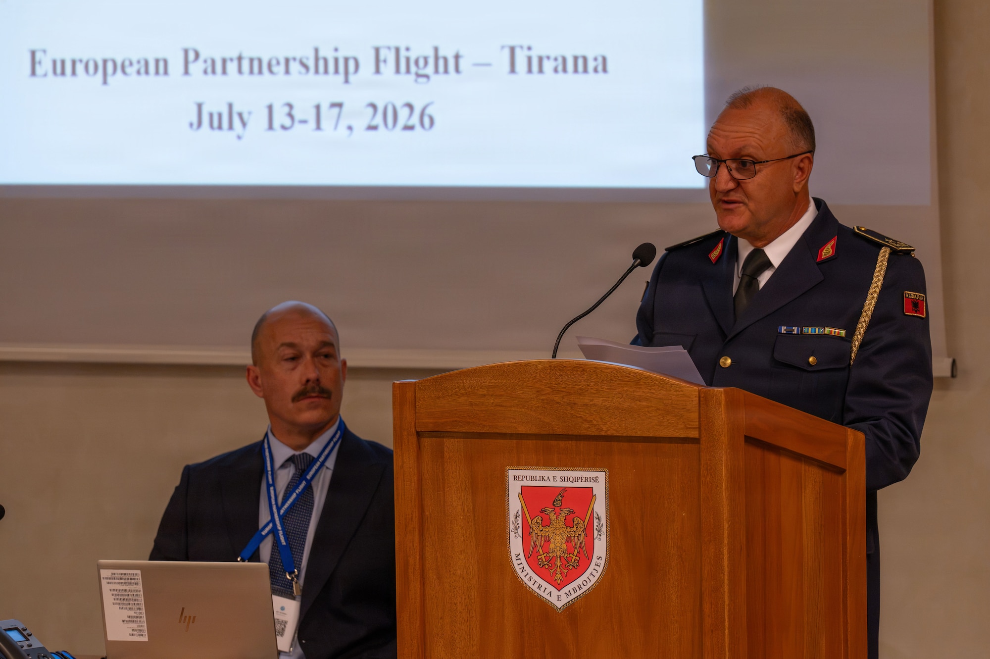 Brig. Gen. Edmond Voci, Air Force of the Republic of Albania commander gives opening remarks prior to the start of the European Partnership Flight conference