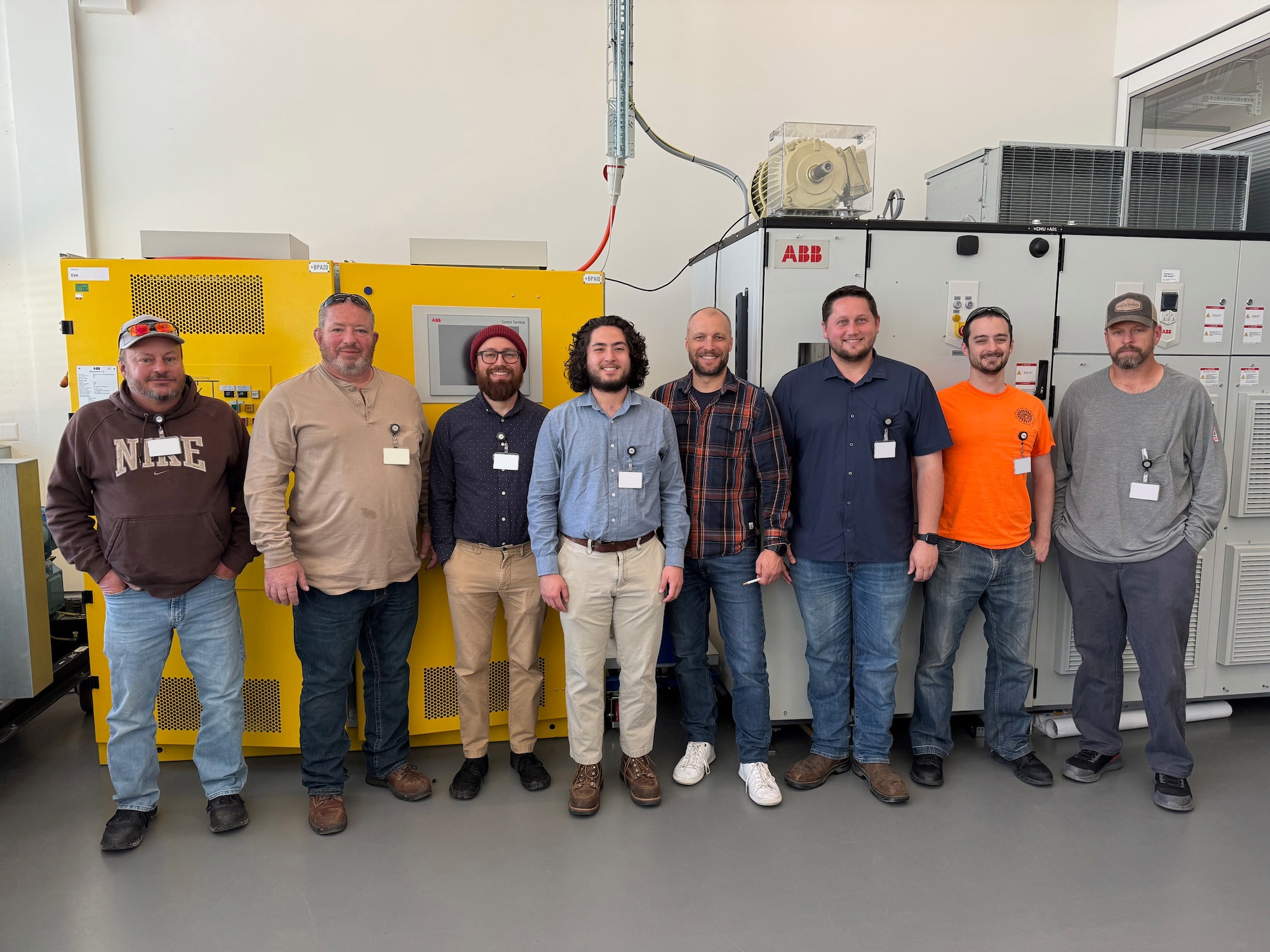 The team of Arnold Engineering Development Complex professionals who recently traveled to Turgi, Switzerland, pose for a photo. During their visit, the team completed factory acceptance testing and training for the Engine Test Facility Plant Variable Frequency Starter System. Pictured left to right, are Rocco Simeri, Kenneth Taylor, Albert Velazquez, Travis Smith, ABB lead trainer Razvan Coman, John Bearden, James Rogers, and Zachary Grosch. (Courtesy photo)