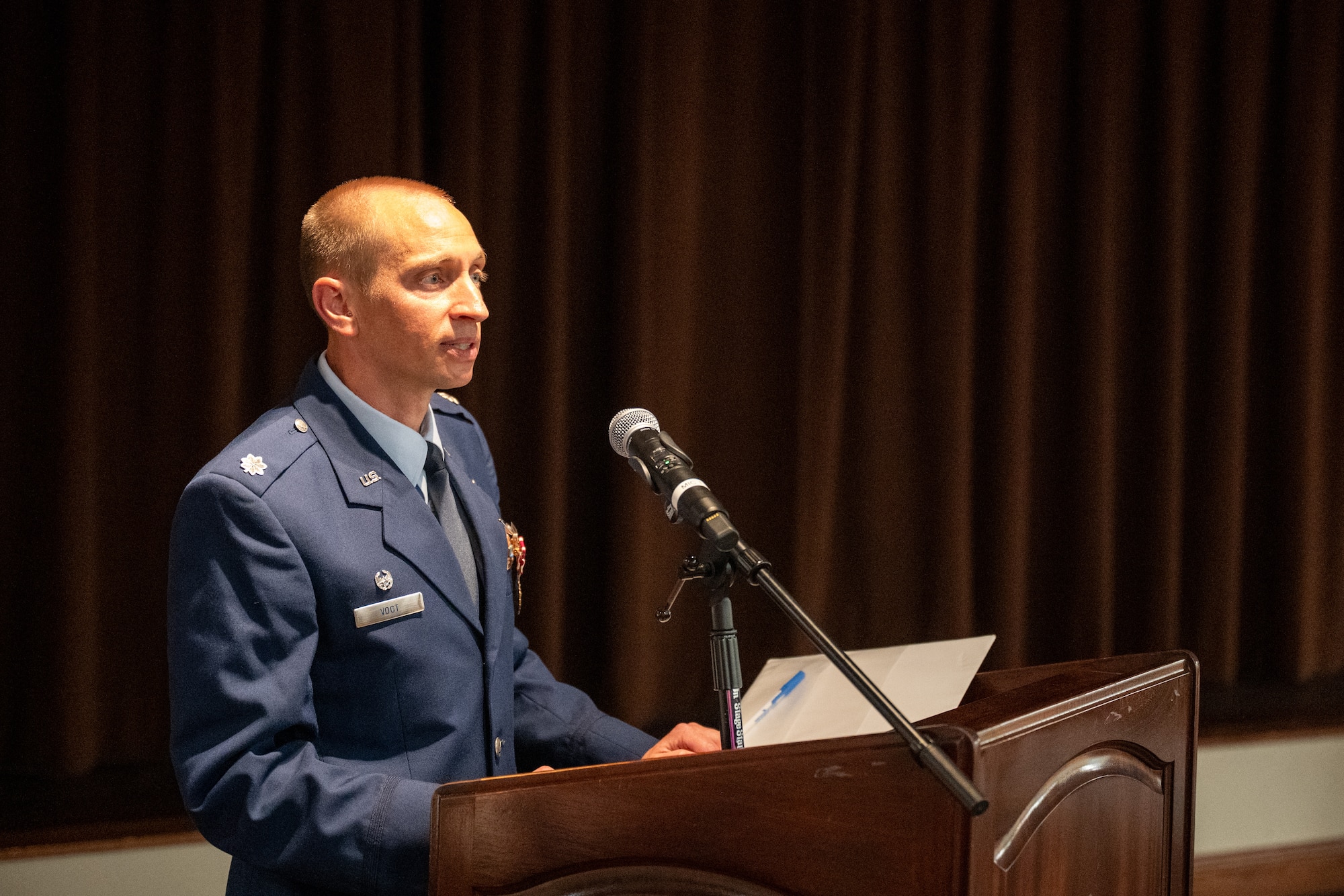 Lt. Col. Robert Vogt, outgoing Geospatial Intelligence Analysis Squadron commander, delivers his farewell address during a change of command ceremony at Wright-Patterson Air Force Base, Ohio, July 1, 2026. Under his leadership, the "Rampant Lions" squadron consistently delivered a critical decision advantage to warfighters, policymakers, and the weapons acquisition community. (U.S. Air Force photo by Staff Sgt. Kristof J. Rixmann)