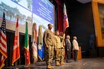 (From left) Lt. Gen. Allan M. Pepin, commanding general, U.S. Army North (Fifth Army); Lt. Col. Garrett Funabiki, U.S. Army North G-4; Sgt. Maj. Matthew Lumbard, U.S. Army North G-3 sergeant major; retired Lt. Gen. Freddie McFarren, former commanding general, U.S. Army North; and retired Lt. Gen. Robert Clark, former commanding general, U.S. Army North, stand beneath the organizational colors during the U.S. Army North (Fifth Army) inactivation ceremony at Joint Base San Antonio–Fort Sam Houston, Texas, July 15, 2026. The gathering brought together past and present leaders to honor the command's legacy as it successfully transitioned its missions and responsibilities to U.S. Army Western Hemisphere Command.