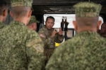 U.S. Army Soldiers assigned to the 59th Aviation Troop Command, South Carolina National Guard, conduct a South Carolina Helicopter Aquatic Rescue Team capabilities briefing for leaders from the Colombian Navy during a Department of War National Guard Bureau State Partnership Program, or SPP, engagement at McEntire Joint National Guard Base in Eastover, South Carolina, July 14, 2026. The briefing included a demonstration of hoisting equipment, and provided a platform for SPP participants to learn how the equipment can be used during a natural disaster or rescue mission. The State Partnership Program is a cooperative military-to-military exchange, administered by the National Guard Bureau, that facilitates cooperation between U.S. National Guard units and foreign allies. Photo by Sgt. Ana-Grace Catoe.