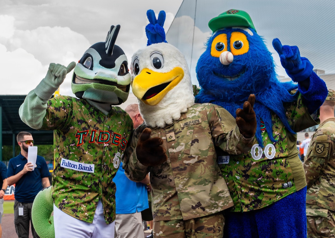 Mascots stand together.
