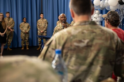 Command chief speaks to attendees at the Technical Sergeant release party.