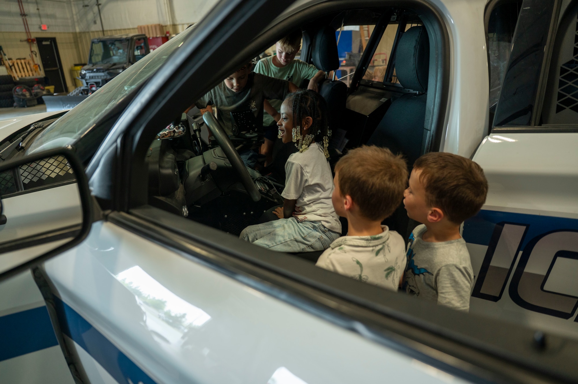 School age care kids tour 319th Security Forces Squadron
