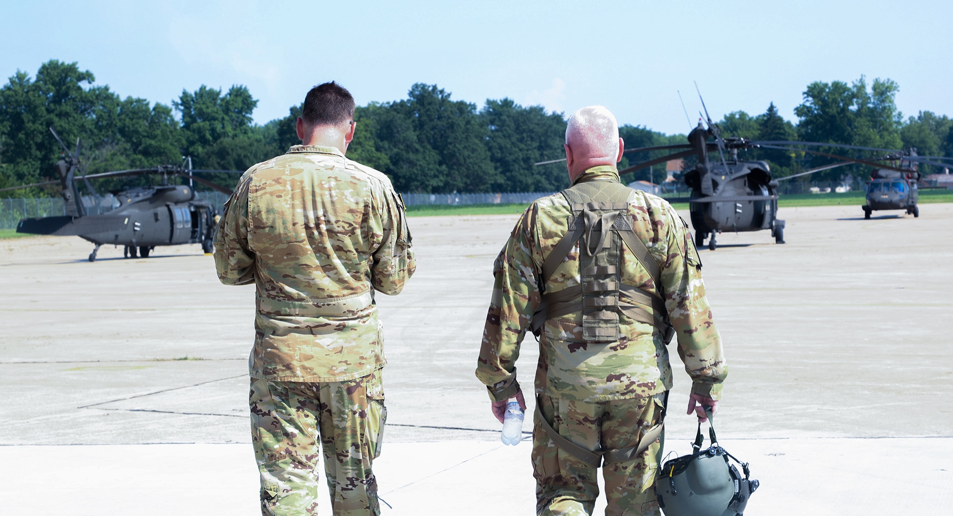 Chief Warrant Officer 5 Herb Stevens, right, State Standardization Pilot and Commander of Army Aviation Support Facility 1 in Kankakee, is joined by Chief Warrant Officer 3 Daniel Wentworth, Illinois Army National Guard Instructor Pilot, on Stevens’ final flight July 16 as an Army Aviator in the Illinois Army National Guard.
