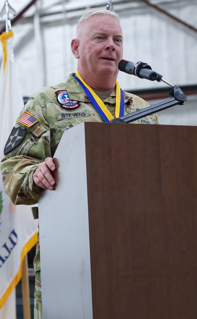 Chief Warrant Officer 5 Herb Stevens, State Standardization Pilot and Commander of the Army Aviation Support Facility (AASF) 1 in Kankakee, thanks family, friends, and fellow Soldiers for their support during a retirement ceremony July 16 at AASF 2 in Decatur.