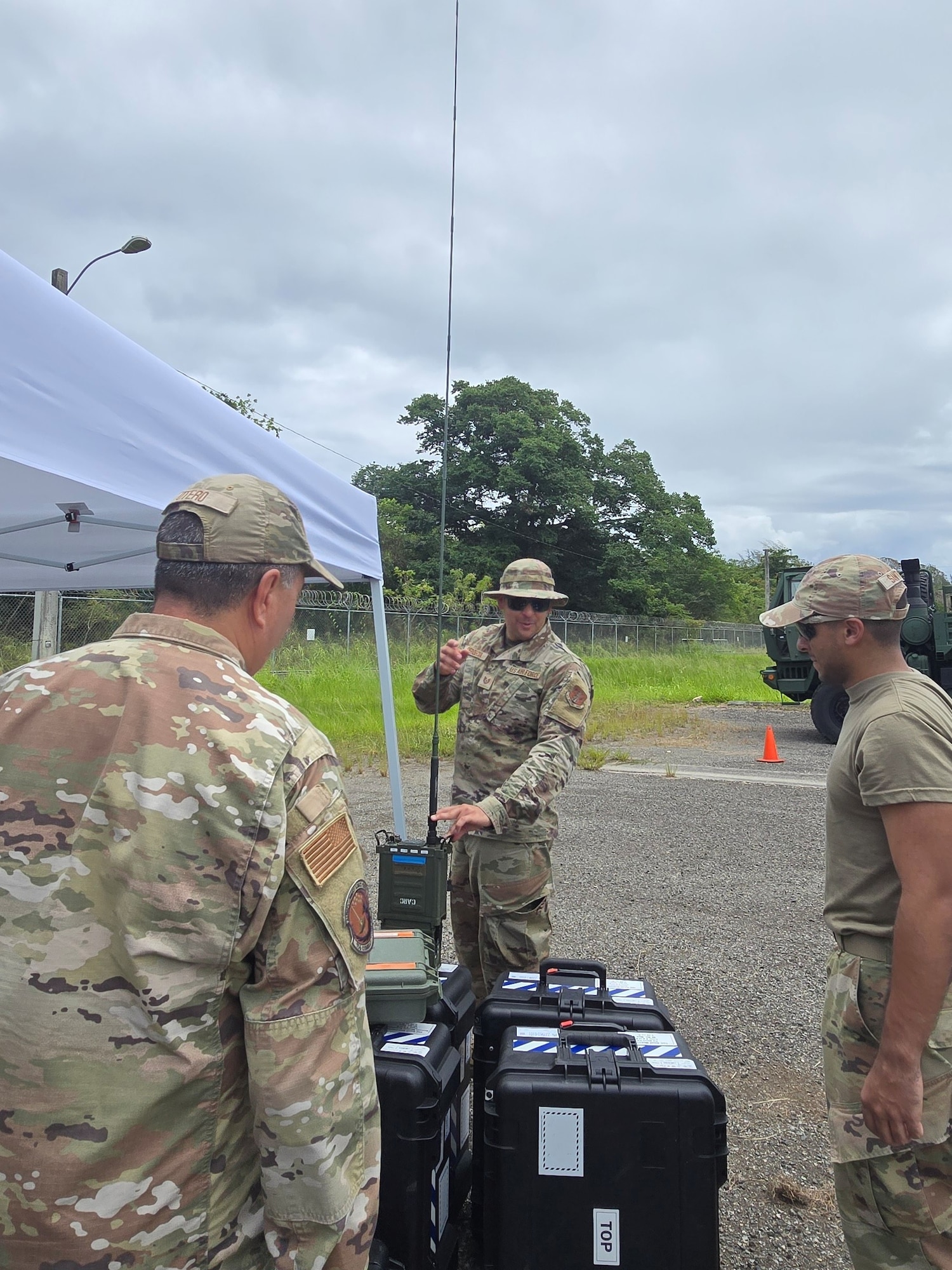 U.S. Air Force Tech. Sgt. Omar Berdecia, a radio frequency transmission systems specialist, sets-up an AN/PRC-160 radio during exercise FUNKY BUSINESS at the 130th Engineer Battalion, Vega Baja, Puerto Rico, June 4, 2026. The exercise tested Airmen's ability to rapidly establish expeditionary communications and sustain mission readiness through realistic deployment operations and disciplined logistical procedures. (U.S. Air National Guard courtesy photo)