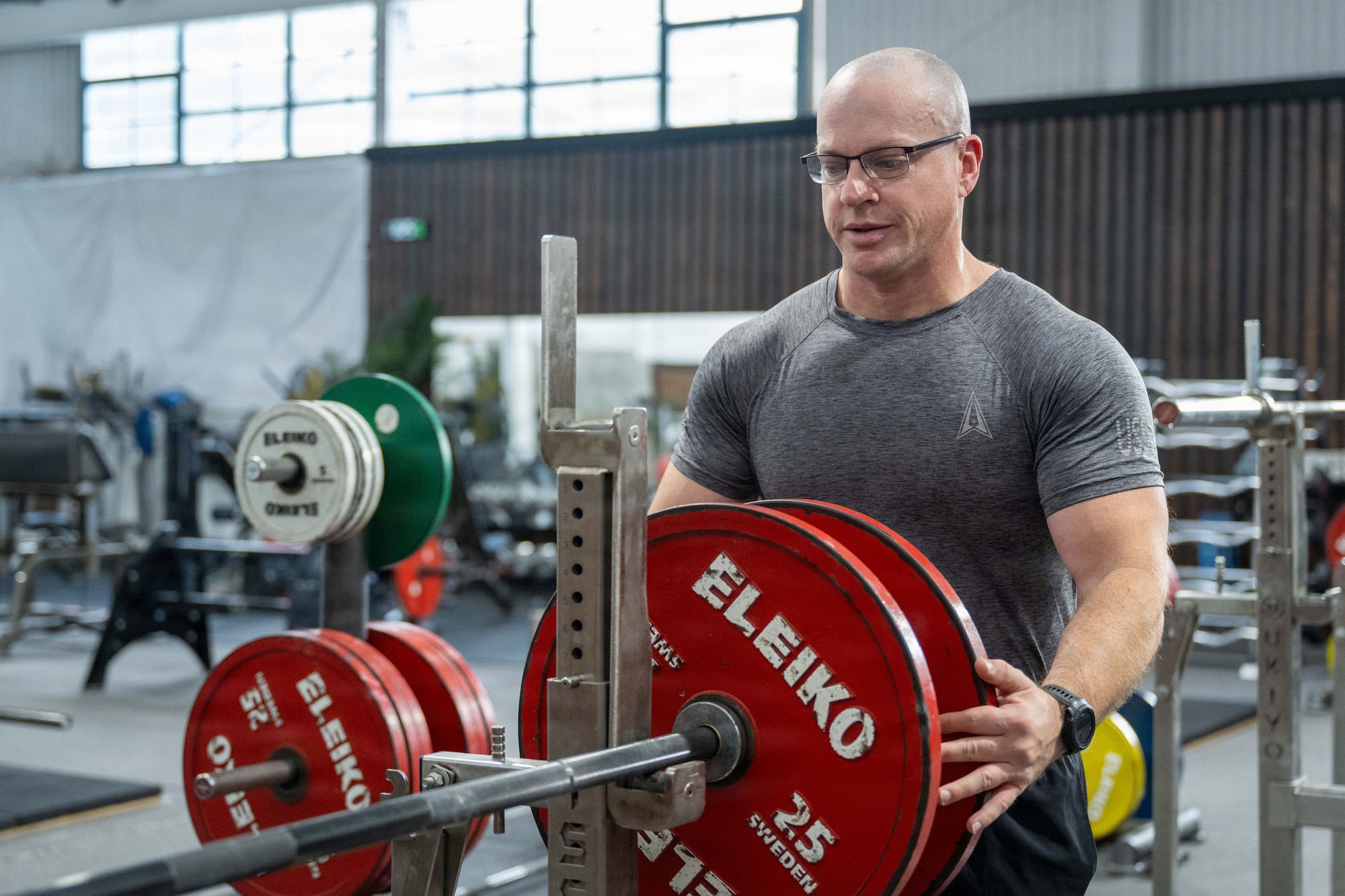 U.S. Space Force 1st Lt. Thomas Moriarty, 53rd Space Operations Squadron Detachment 4 operations officer, works out in a gym in Honolulu.