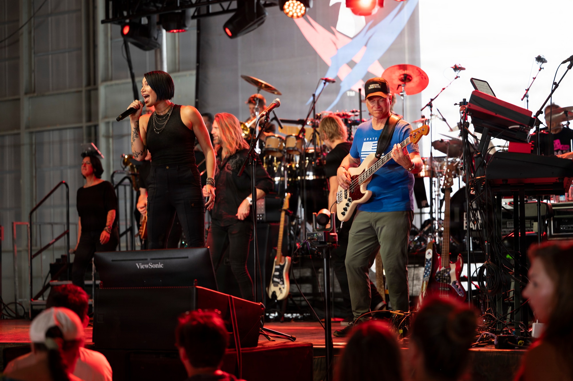 Members of the Lt. Dan Band perform during a concert at Holloman Air Force Base, New Mexico, July 12, 2026. Since 2003, Gary Sinise and the Lt. Dan Band have performed over 600 shows at military installations for service members, first responders, veterans and their families to raise money through the Gary Sinise Foundation in support of disabled veterans. (U.S. Air Force photo by Senior Airman Michelle Ferrari)