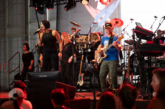 Members of the Lt. Dan Band perform during a concert at Holloman Air Force Base, New Mexico, July 12, 2026. Since 2003, Gary Sinise and the Lt. Dan Band have performed over 600 shows at military installations for service members, first responders, veterans and their families to raise money through the Gary Sinise Foundation in support of disabled veterans. (U.S. Air Force photo by Senior Airman Michelle Ferrari)