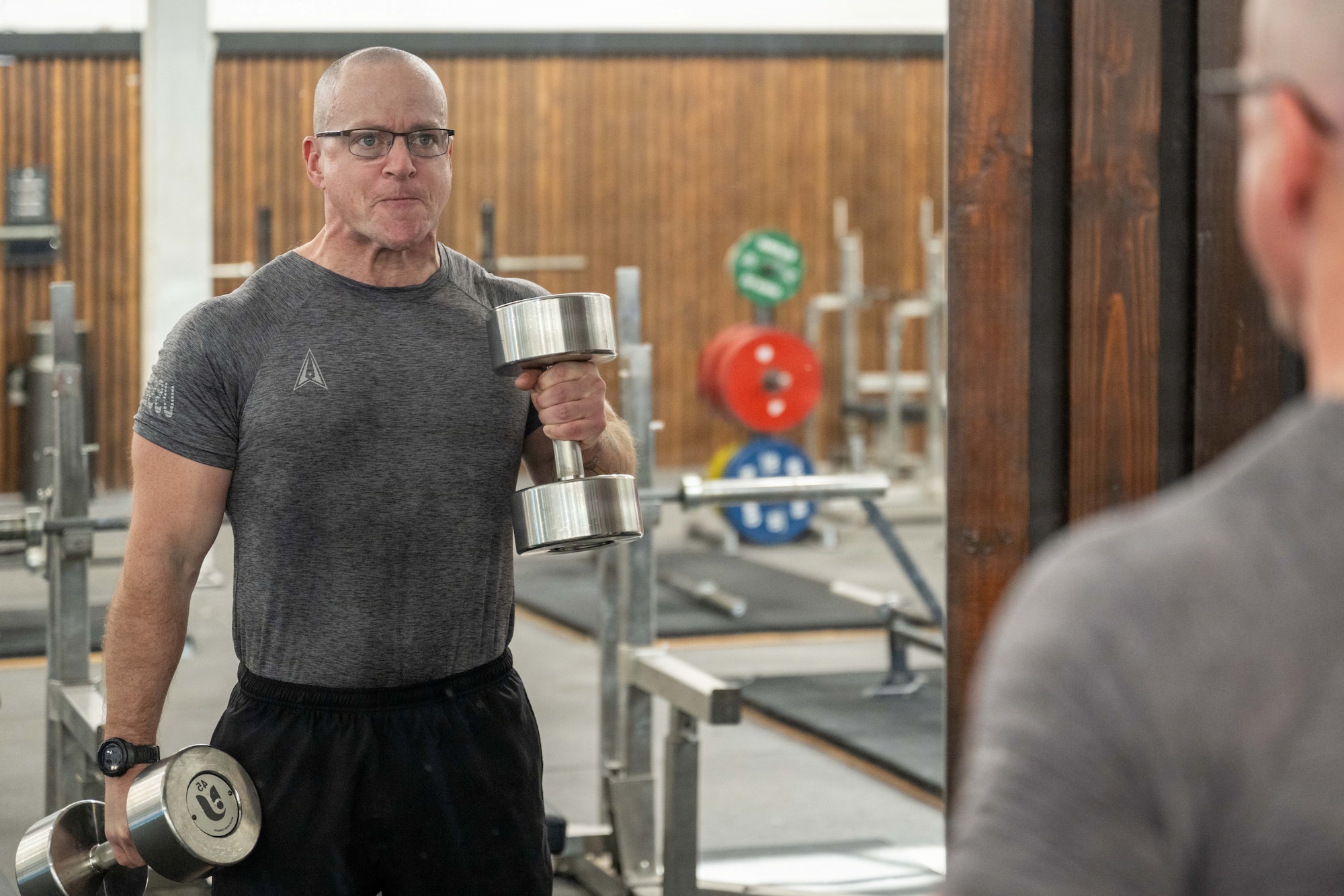 U.S. Space Force 1st Lt. Thomas Moriarty, 53rd Space Operations Squadron Detachment 4 operations officer, works out in a gym in Honolulu.