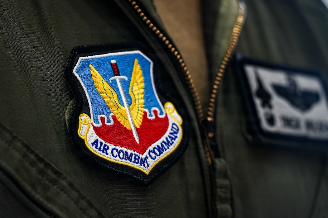 An Air Combat Command patch is worn during a change of command ceremony.