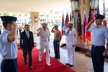 Adm. Samuel J. Paparo, right, commander of U.S. Pacific Command, salutes during an honors ceremony welcoming His Excellency Fernando Barros, left, Minister of National Defense of Chile, to the US PACOM headquarters building at Camp H.M. Smith, Hawaii, July 17, 2026.
