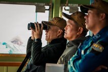 The key officers assigned to the Philippine Navy Miguel Malvar-class guided-missile frigate BRP Miguel Malvar (FFG06) overlook as the USNS Guadalupe comes alongside for a replenishment-at-sea in the Pacific Ocean during Exercise Rim of the Pacific 2026, July 11, 2026.