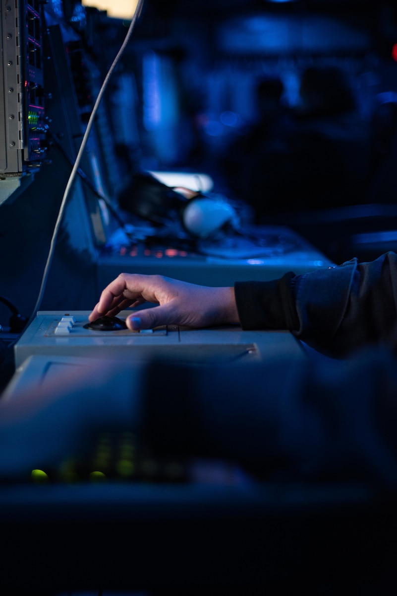 Male hand on computer.