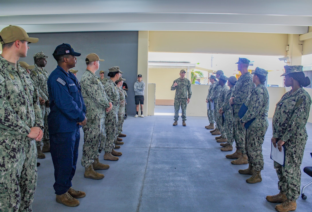 NAVAL BASE GUAM (July 13, 2026) - Sailors assigned to U.S. Naval Base Guam (NBG) were frocked to Petty Officer 2nd Class during a ceremony at the NBG Security Headquarters, July 10. 
NBG Commanding Officer Capt. Shawn William presented the Sailors with their frocking letters and their devices were replaced by fellow Sailors and mentors.NAVAL BASE GUAM (July 13, 2026) - Sailors assigned to U.S. Naval Base Guam (NBG) were frocked to Petty Officer 2nd Class during a ceremony at the NBG Security Headquarters, July 10. 
NBG Commanding Officer Capt. Shawn William presented the Sailors with their frocking letters and their devices were replaced by fellow Sailors and mentors.