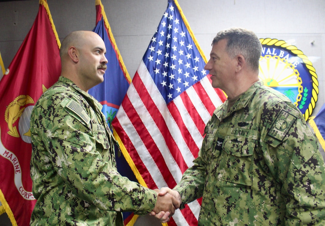 NAVAL BASE GUAM (June 16, 2026) - U.S. Naval Base Guam (NBG) Sailor, Master-at-Arms 1st Class (MA1) James C. Bowman, received the Navy and Marine Corps Commendation Medal as Joint Region Marianas Senior Sailor of the Year 2025. 

The award was presented by NBG Commanding Officer Capt. Shawn William at the NBG Headquarters, June 16. 

Bowman currently serves as Departmental Leading Petty Officer for NBG Harbor Patrol Unit and has served at NBG since October 2022. 

He led 35 Harbor Security Sailors at NBG Harbor Patrol Unit, resulting in seven Sailor of the Quarters, six advancements, 12 spot awards, six reenlistments, and seven Sailors enrolled in higher education. As the assistant Command Fitness Leader, he facilitated the 2025 Physical Fitness Assessment resulting in a 98 percent pass rate.