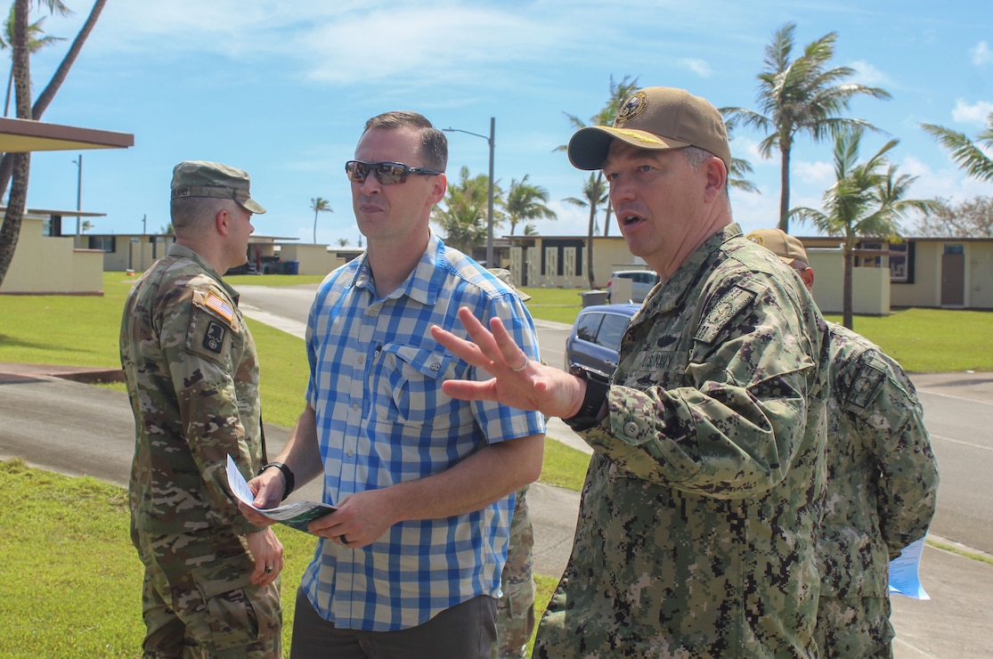 NAVAL BASE GUAM (July 15, 2026) - U.S. Naval Base Guam (NBG) Commanding Officer Capt. Shawn William, welcomed Assistant Secretary of War for Manpower and Reserve Affairs Hon. Tim Dill during a tour of the installation, July 10. 
Dill serves as the principal advisor to the Secretary of War and Undersecretary of War for Personnel and Readiness on all matters related to military and civilian personnel policies, reserve integration, and military community and family policy. He also oversees the Department of War Education Activity and the Defense Commissary Agency (DeCA). 
While on tour of the installation, Dill visited NBG family and unaccompanied housing areas, NBG Child Development Center, and the Emergency Family Assistance Center. Dill also met with DeCA officials. 
Dill’s visit was intended to expand understanding of military capabilities, challenges, infrastructure, and ongoing military operations throughout Guam.