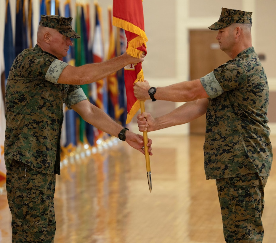 U.S. Marine Corps Sgt. Maj. Christopher R. Denham, left, the command senior enlisted 

leader of 2nd Marine Expeditionary Brigade, transfers the colors to Brig. Gen. Robert S. 

Weiler, the oncoming commanding general of 2nd Marine Expeditionary Brigade, during the 

2nd MEB Change of Command ceremony at Marine Corps Base Camp Lejeune, North 

Carolina, June 29, 2026. During the ceremony, Col. Roe S. Lemons Jr. relinquished 

command of 2nd MEB to Brig. Gen. Robert S. Weiler. (U.S. Marine Corps photo by Lance 

Cpl. Aegean DeVaughn-Wilson)