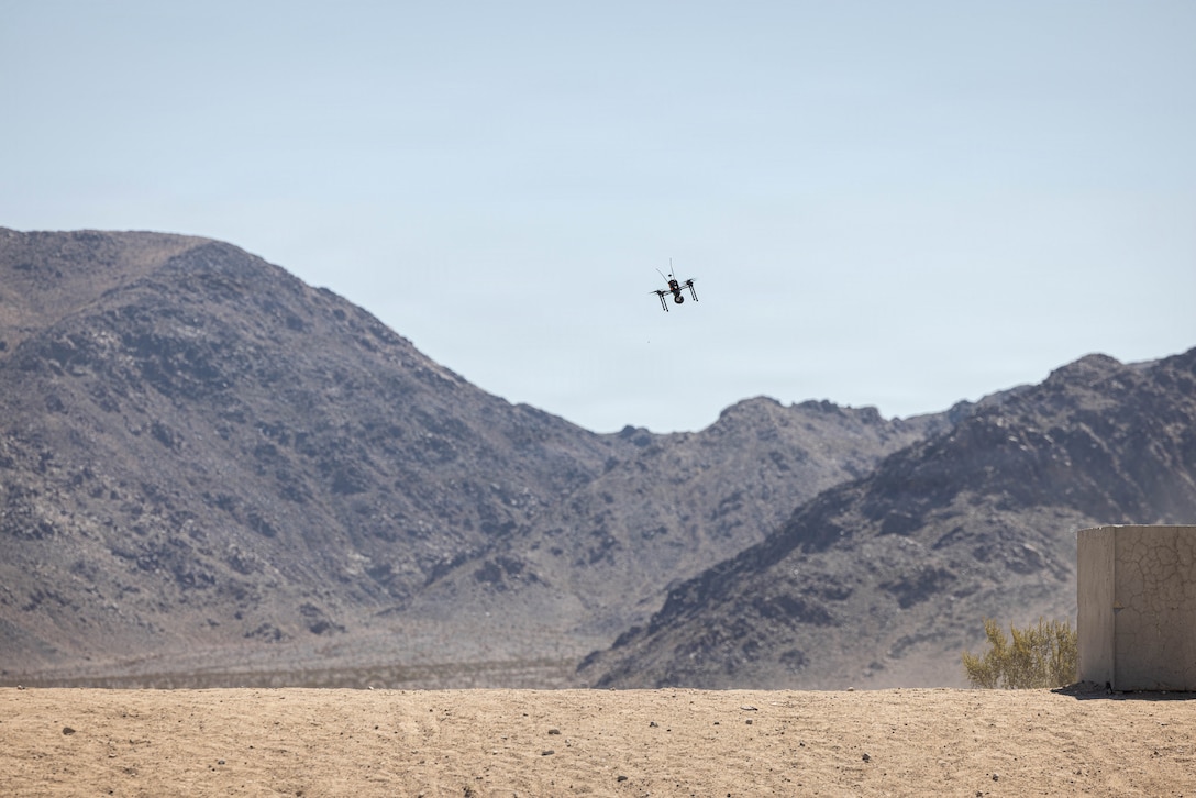 A Neros Archer first-person view drone with 2nd Battalion, 2nd Marine Regiment, 2nd Marine Division, flies on Range 110 during Service Level Training Exercise 4-26 on Marine Corps Air Ground Combat Center, Twentynine Palms, California, July 15, 2026. SLTE 4-26 is designed to be a challenging, realistic training environment that produces combat-ready forces capable of operating as an integrated Marine Air Ground Task Force across all domains of military operations. (U.S. Marine Corps photo by Sgt. Alexis French)