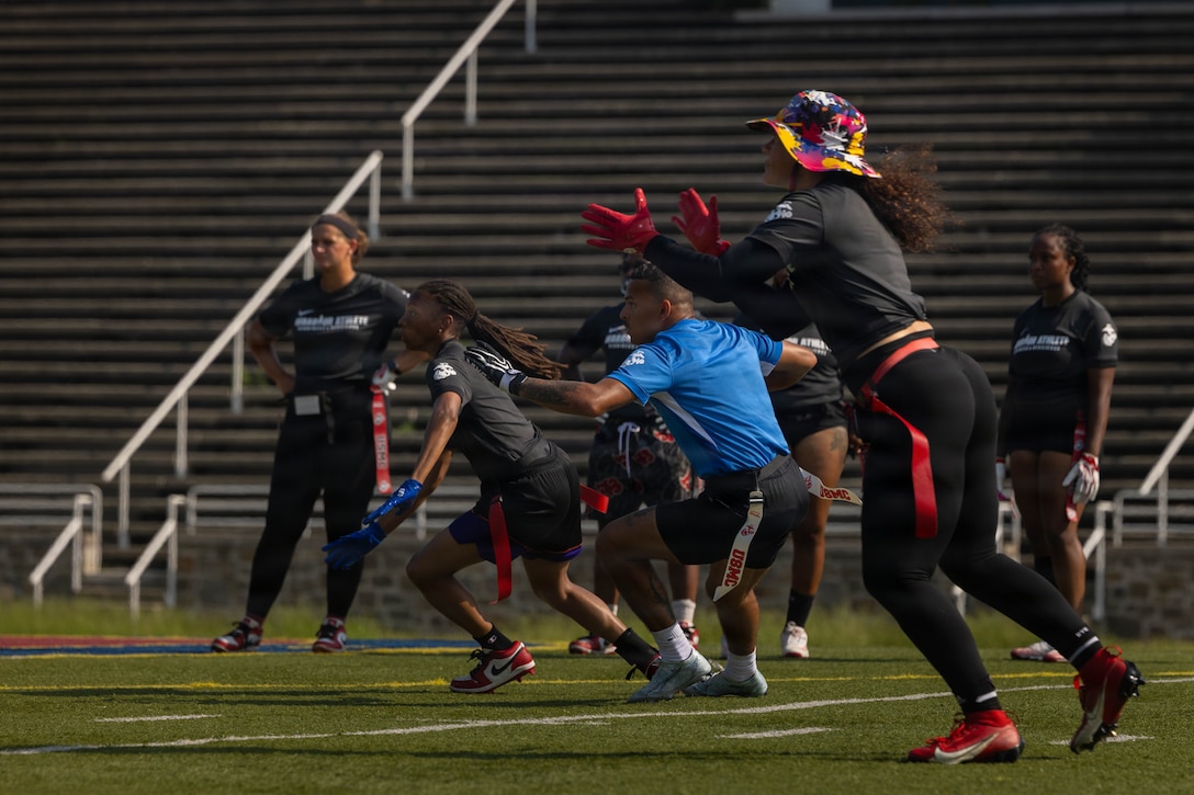 U.S. Marines with the All-Marine Sports Flag Football men’s and women’s teams practice drills at Butler Stadium on Marine Corps Base Quantico, Virginia, July 15, 2026. The All-Marine Sports Flag Football men’s and women’s teams practiced drills before their upcoming tournament in San Antonio. The program provides elite Marine athletes opportunities to compete at the Armed Forces Championships, National Championships, Conseil International du Sport Militaire Championships, and the Olympic Games. (U.S. Marine Corps photo by Cpl. Harleigh Faulk)