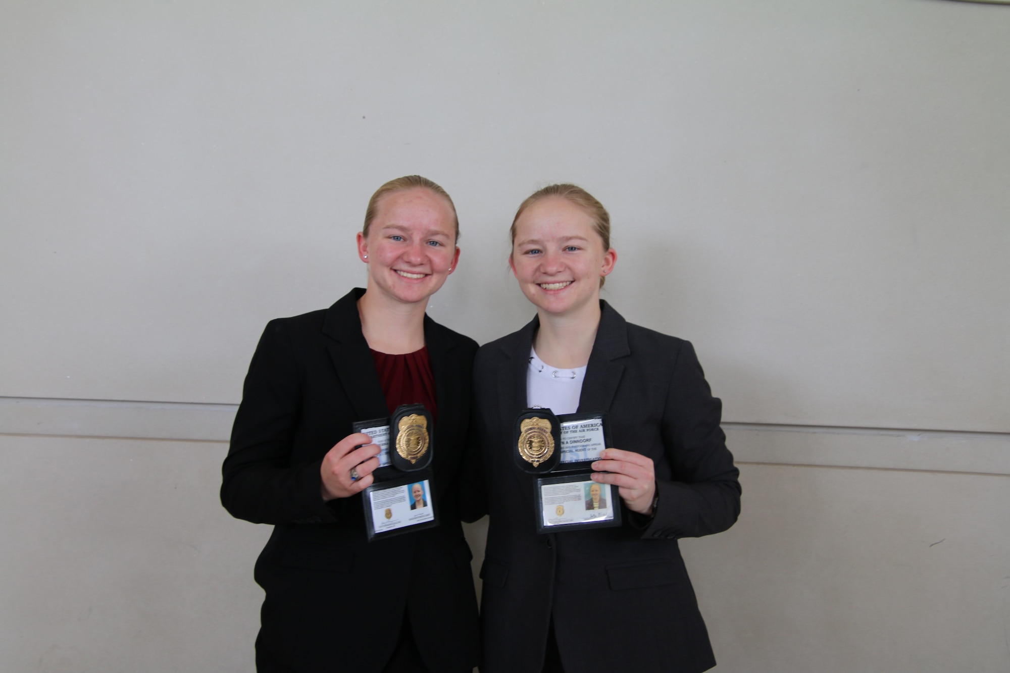 Special Agents Kaitlyn and Sierra Dinndorf both serve in the Air Force Office of Special Investigations.