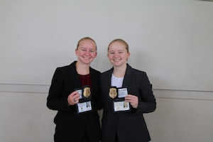 Special Agents Kaitlyn and Sierra Dinndorf both serve in the Air Force Office of Special Investigations.
