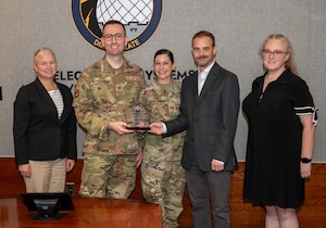 Image of people receiving an award
