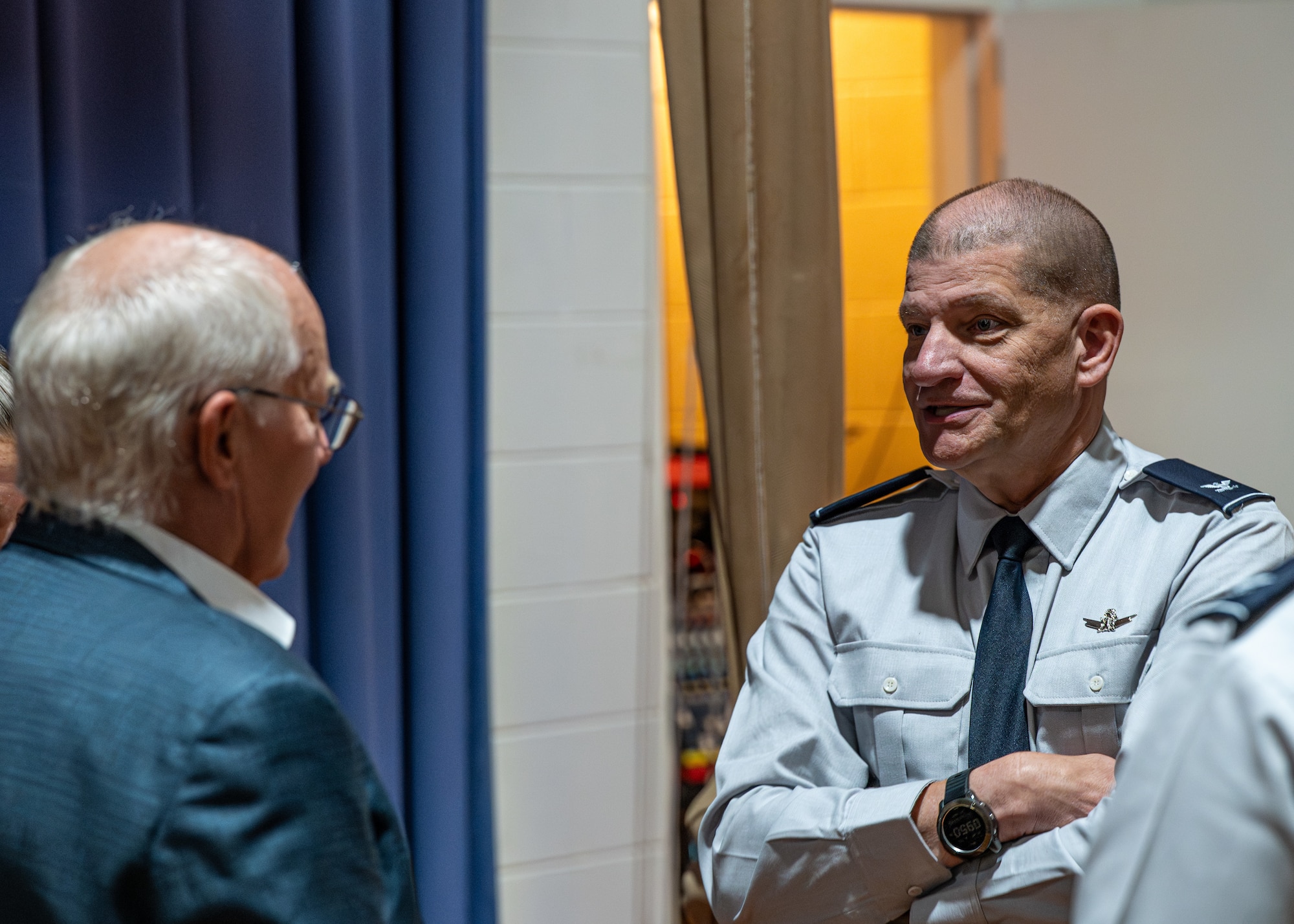 Dr. Andrew Aldrin speaks with attendees for a presentation.