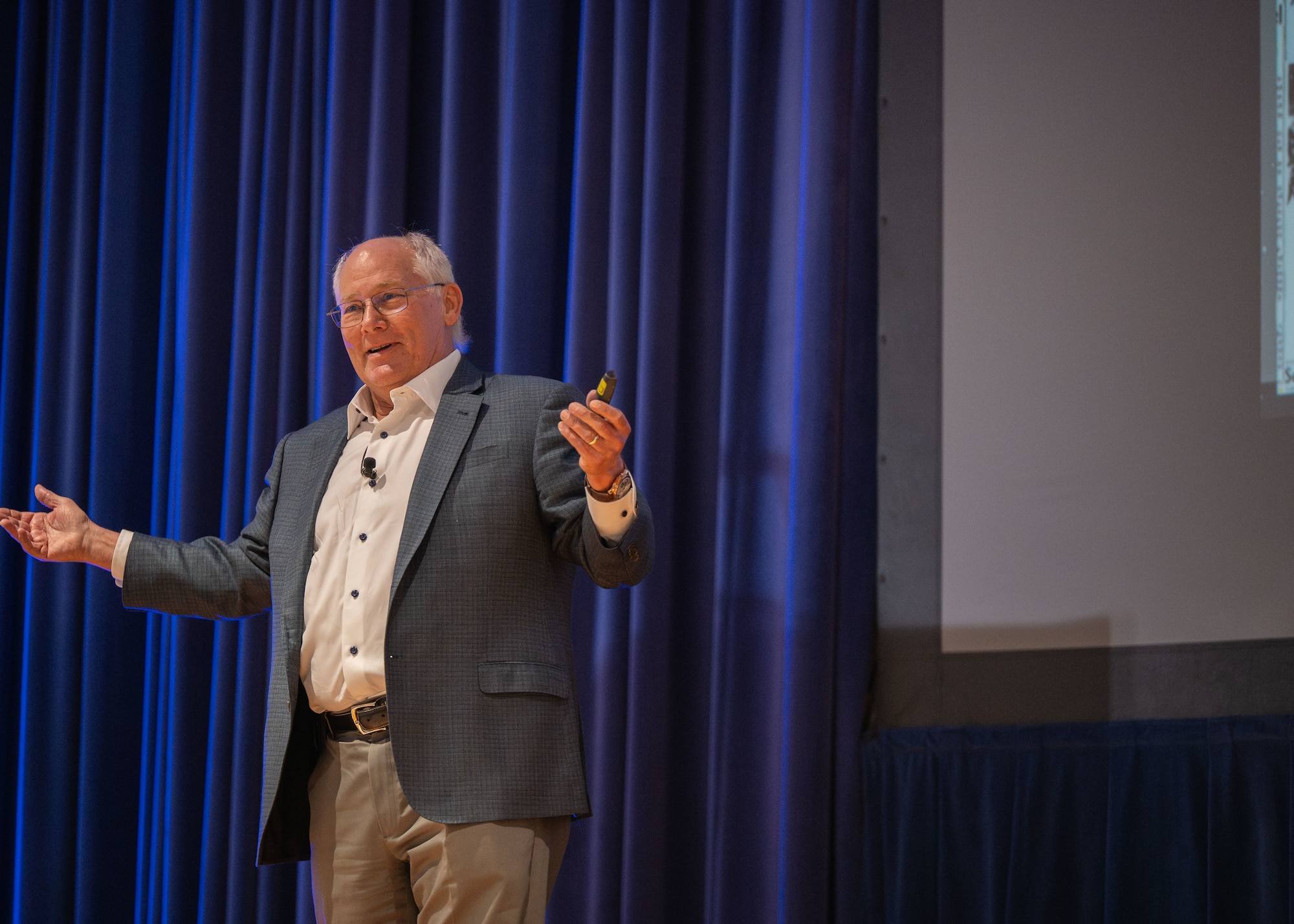 Dr. Andrew Aldrin speaks with attendees for a presentation.
