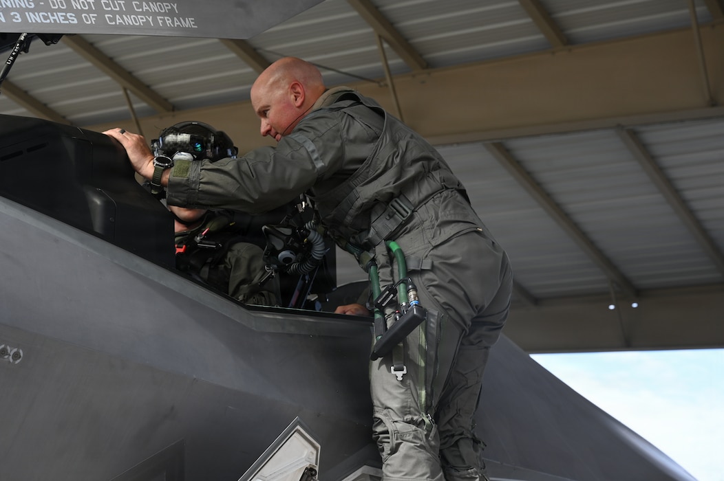 U.S. Air Force Brig. Gen. David Berkland, 56th Fighter Wing commander, instructs a student pilot before their first flight at Luke Air Force Base, Arizona, July 15, 2026.