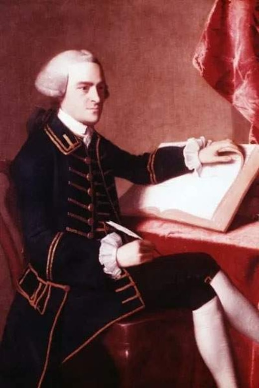 A man wearing a colonial suit.