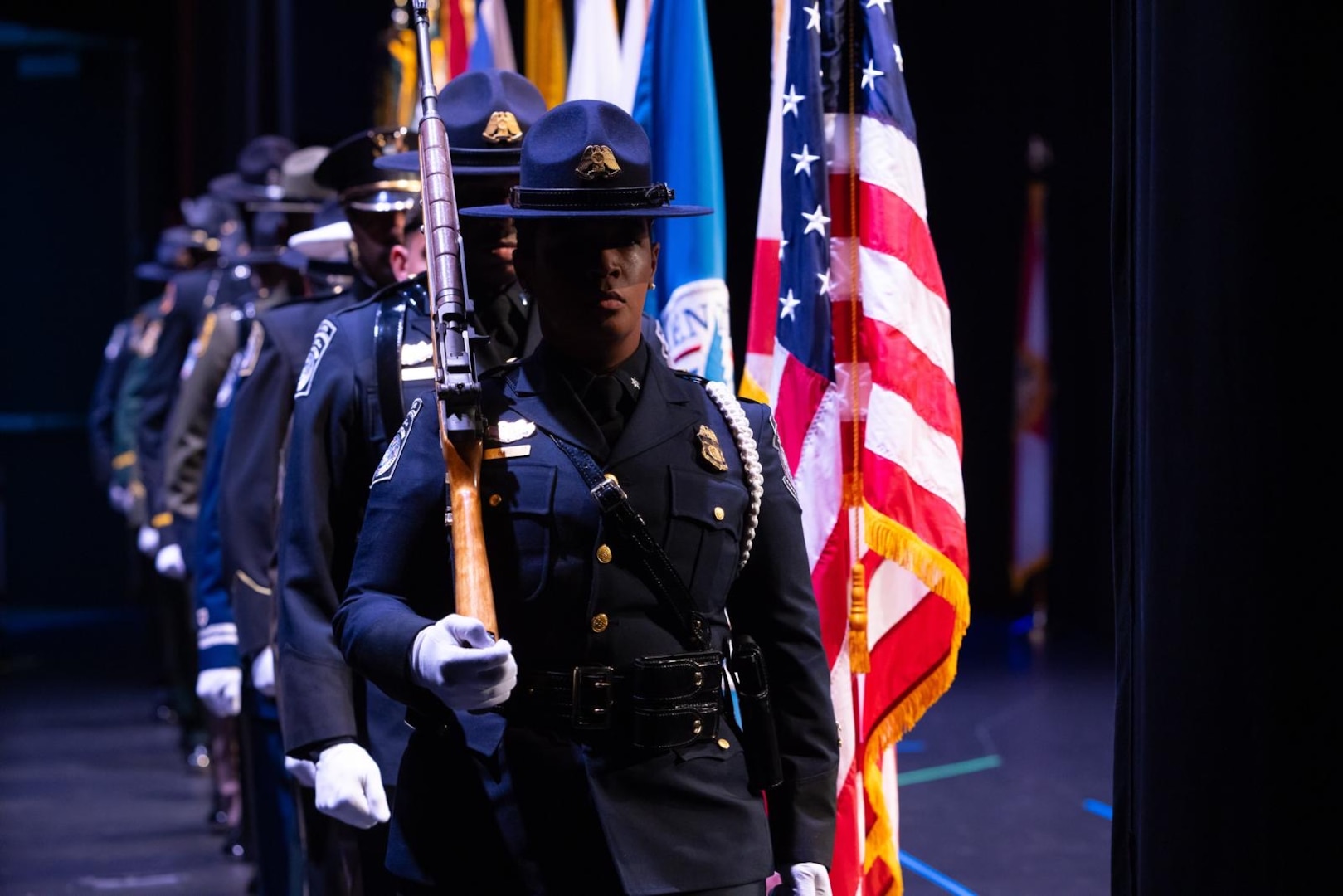 Members of a joint color guard retire the colors during the inaugural Florida Department of Homeland Security Awards Ceremony at the Clermont Performing Arts Center in Clermont, Florida, July 15, 2026. The event recognized state and federal partnerships as well as individuals nominated for their contribution during joint operations to protect our nation and safeguard the State of Florida in the past year.