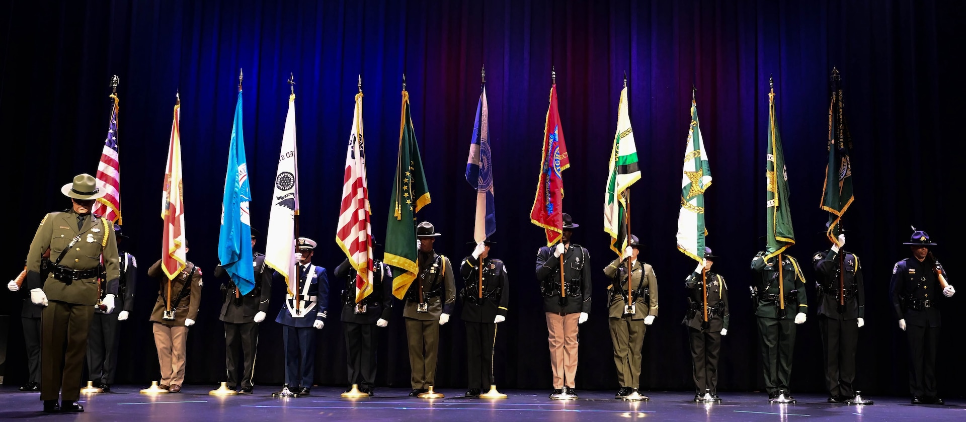Members of a joint color guard present the colors during the inaugural Florida Department of Homeland Security Awards Ceremony at the Clermont Performing Arts Center in Clermont, Florida, July 15, 2026. The event recognized state and federal partnerships as well as individuals nominated for their contribution during joint operations to protect our nation and safeguard the State of Florida in the past year.