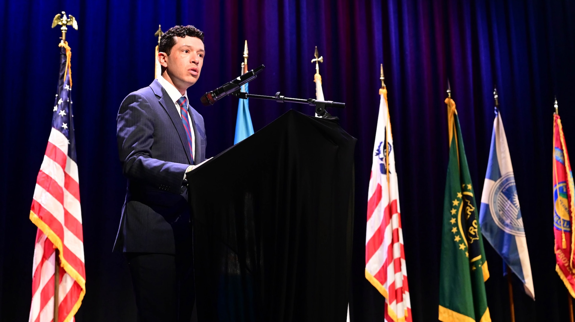 A guest speaker delivers remarks during the inaugural Florida Department of Homeland Security Awards Ceremony at the Clermont Performing Arts Center in Clermont, Florida, July 15, 2026. The event recognized state and federal partnerships as well as individuals nominated for their contribution during joint operations to protect our nation and safeguard the State of Florida in the past year.