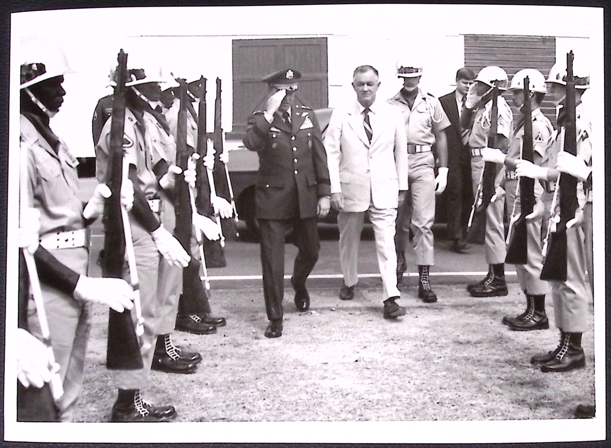 Dedication of the U.S. Army Transportation Museum. (Left to Right) U.S. Army Maj. Gen. Alton G. Post, Fort Eustis commander, and Honorable Mills P. Godwin, Governor, Commonwealth of Virginia, as they cut ribbon by spinning the wheel. (Courtesy photo by C.E. Williams, David Byrd, TASO Photo, from U.S. Army Transportation Museum Photo Collection)