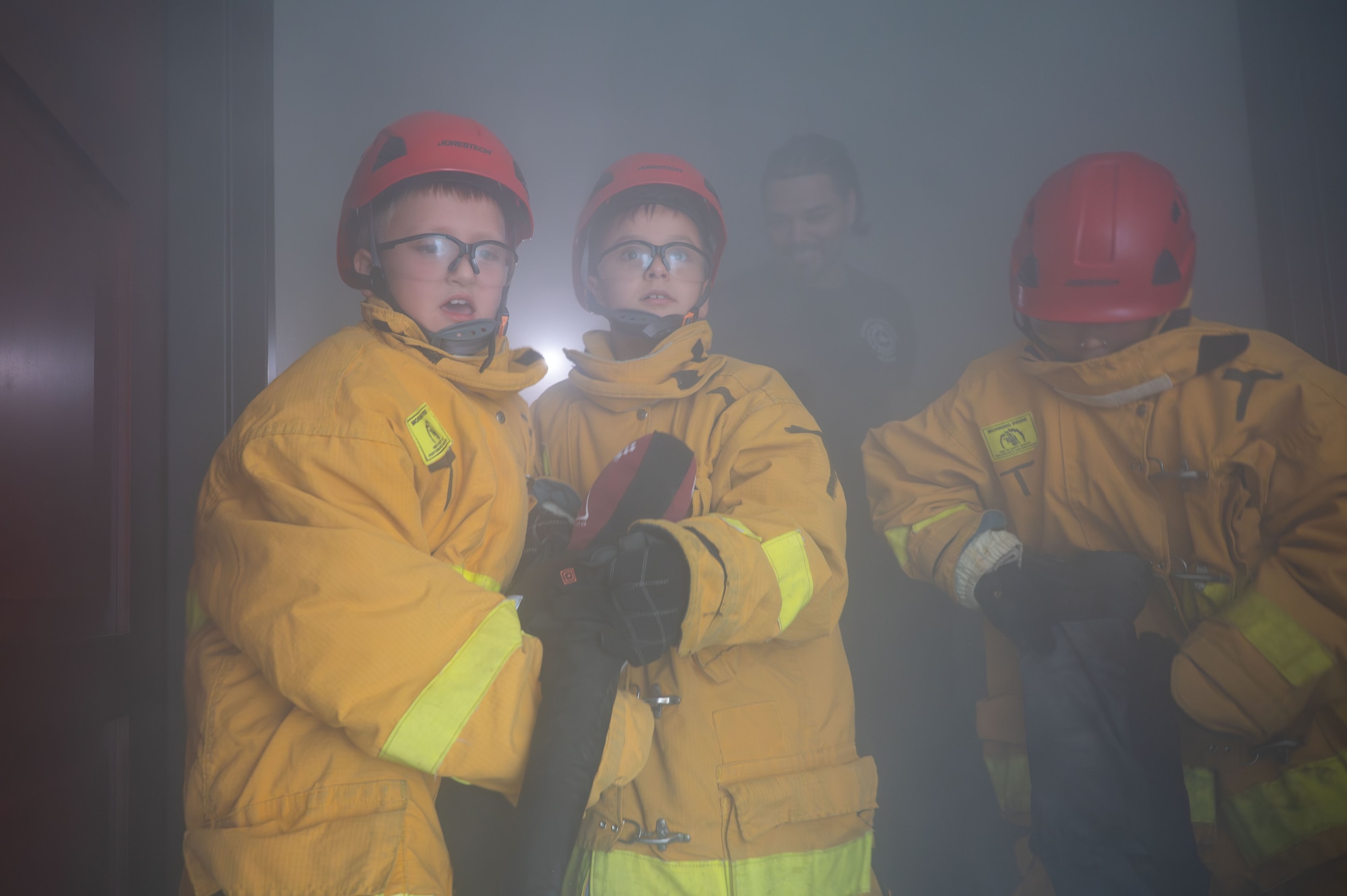 Dalton Silva and Lucas Crusberg participate in a search and rescue exercise during Junior Firefighter Camp, Goodfellow Air Force Base, Texas, July 16, 2026.