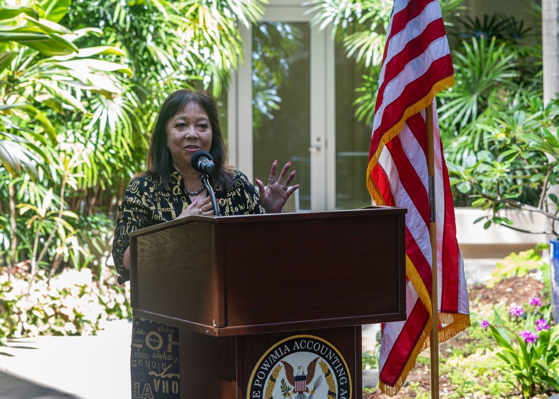 Jennifer Sabas, Director of the Daniel K. Inouye Institute, speaks during a flag presentation ceremony at Joint Base Pearl Harbor-Hickam, Hawaii, July 17, 2026.