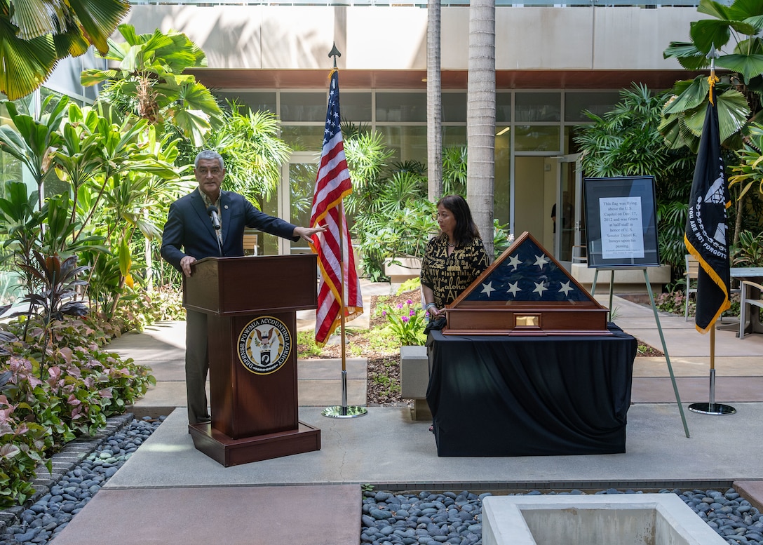 Kelly McKeague, Defense POW/MIA Accounting Agency Director, and Jennifer Sabas, Director of the Daniel K. Inouye Institute, speak during a flag presentation ceremony at Joint Base Pearl Harbor-Hickam, Hawaii, July 17, 2026.
