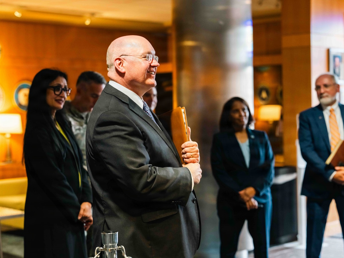 Christopher B. Roberts, Auburn University president, listens to a briefing during a tour at Maxwell Air Force Base, AL, July 10, 2026.