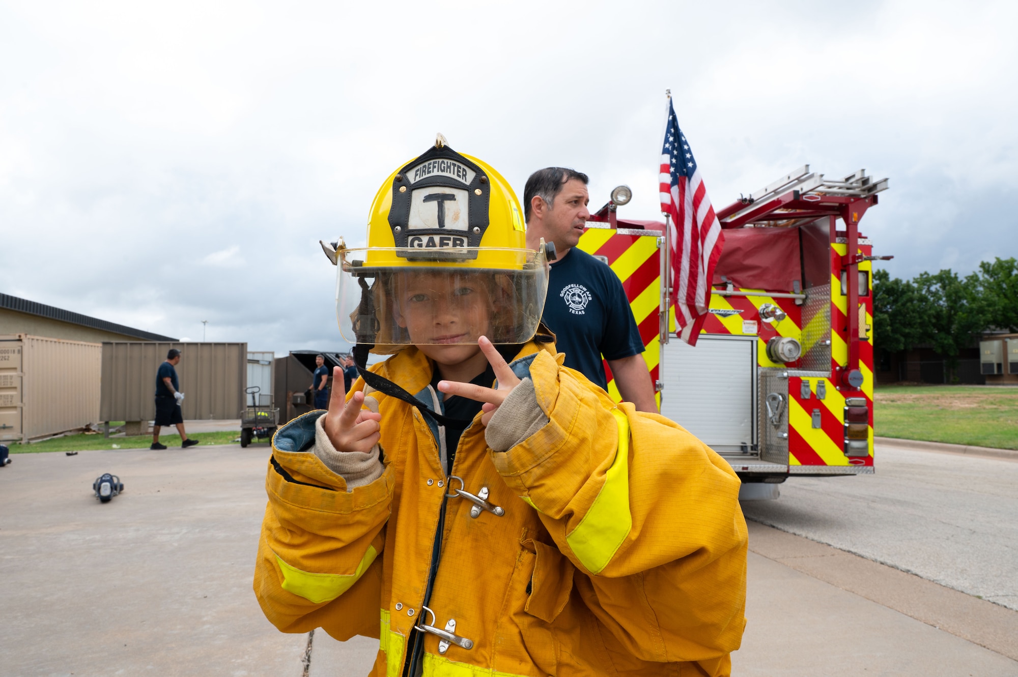 Travis Holyoak, junior firefighter, poses for a picture during Junior Firefighter Camp, Goodfellow Air Force Base, Texas, July 14, 2026.