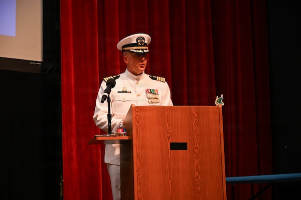 U.S. Navy Capt. Richard Lawrence, outgoing commanding officer, Navy Medicine Training Support Command, delivers remarks during a change of command ceremony by which U.S. Navy Capt. Lacy Gee relieved Lawrence as commanding officer, at Joint Base San Antonio-Fort Sam Houston, July 17, 2026. (U.S. Navy photo by Mass Communication Specialist Seaman Christine Walters)