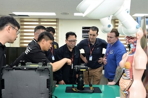 Republic of Korea Air Force Investigative Agency personnel demonstrate forensic laboratory equipment to members of the Air Force Office of Special Investigations’ 5th Field Investigations Squadron during a subject matter expert exchange May 14, 2026.