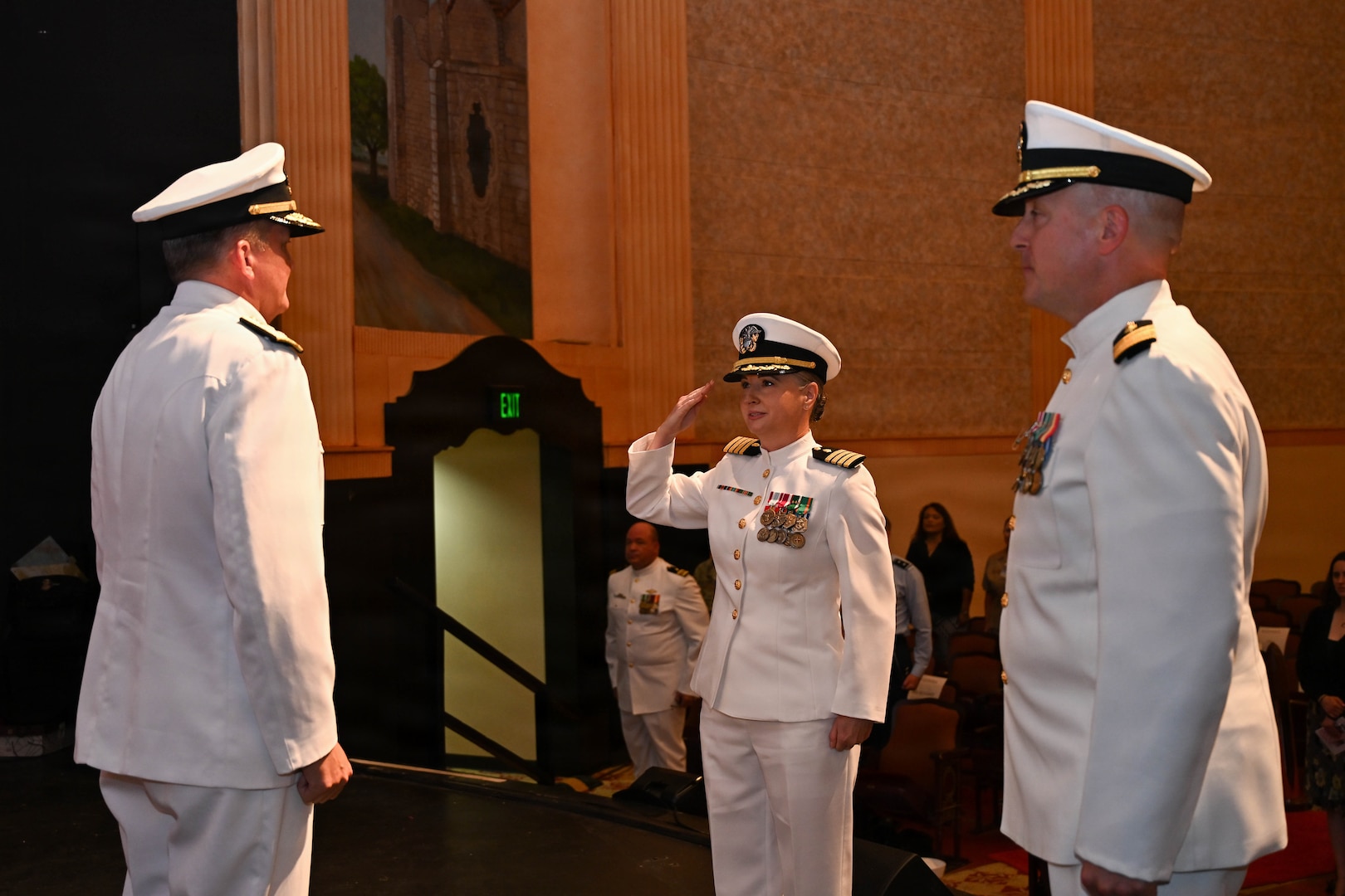 U.S. Navy Capt. Lacy Gee reports to U.S. Navy Rear Adm. Walter Brafford, presiding officer and commander, Naval Medical Forces Development Command, during a change of command ceremony by which Gee relieved U.S. Navy Capt. Richard Lawrence as commanding officer, Navy Medicine Training Support Command, July 17, 2026. (U.S. Navy photo by Mass Communication Specialist Seaman Christine Walters)