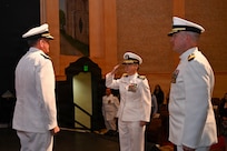 U.S. Navy Capt. Lacy Gee reports to U.S. Navy Rear Adm. Walter Brafford, presiding officer and commander, Naval Medical Forces Development Command, during a change of command ceremony by which Gee relieved U.S. Navy Capt. Richard Lawrence as commanding officer, Navy Medicine Training Support Command, July 17, 2026. (U.S. Navy photo by Mass Communication Specialist Seaman Christine Walters)