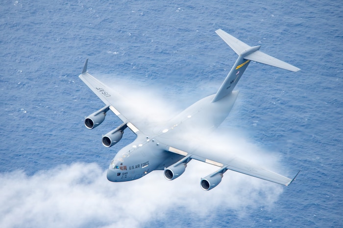 A U.S. Air Force C-17 Globemaster III piloted and crewed by the 204th Airlift Squadron, 154th Wing, Hawaii Air National Guard conducts a training sortie, Jan. 5, 2026. The ensuing flight included all aircraft types operated by the 154th Operations Group, showcasing the wing’s ability to project power across the Pacific. (U.S. Air National Guard photo by Senior Master Sgt. Mysti Bicoy)